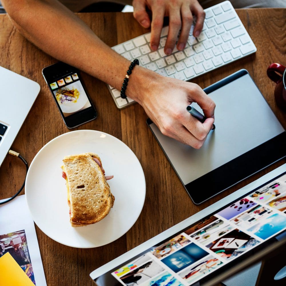 A person is sitting at a table engaged in local SEO.