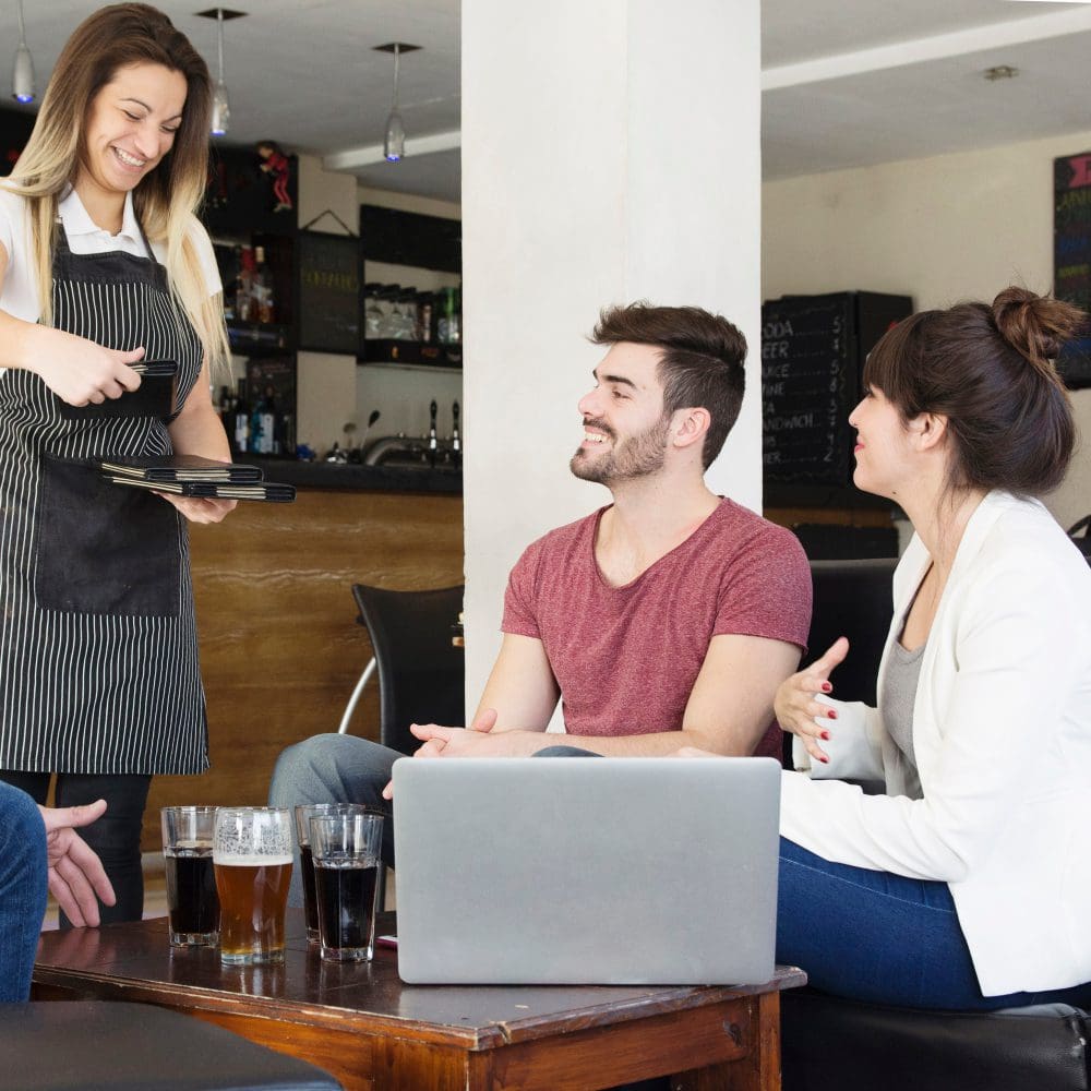 A woman demonstrating the importance of local SEO while wearing a blue apron.